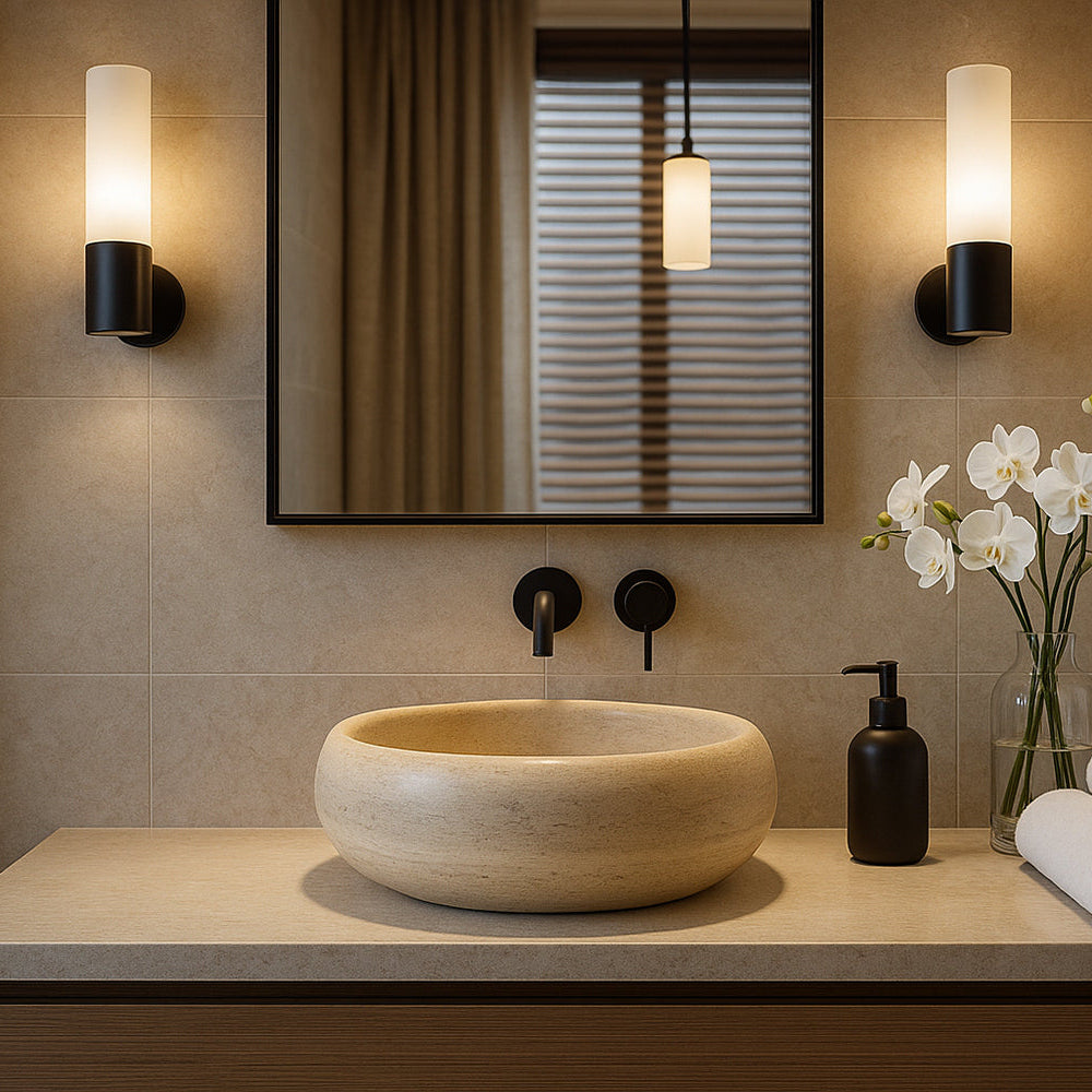 Bathroom vanity with a sink, mirror, and decorative elements.